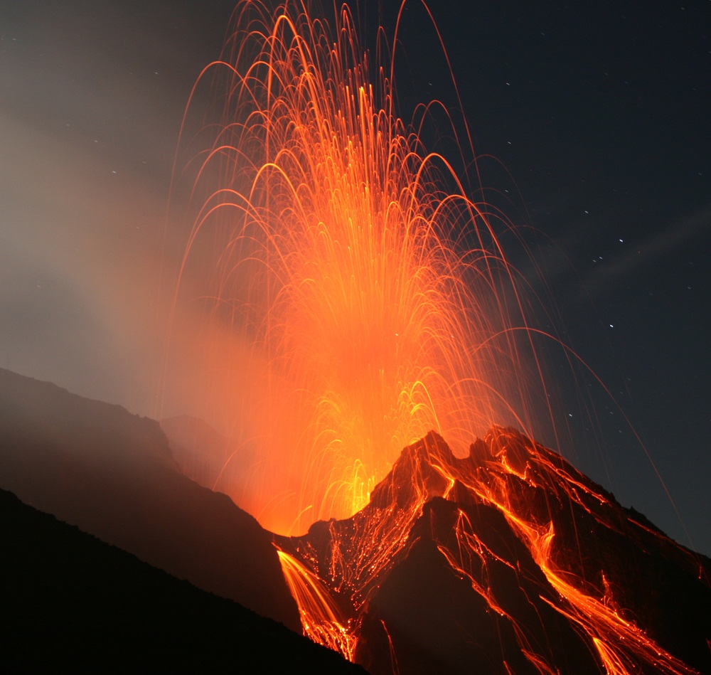 Stromboli is a volcano off the coast of Italy that erupts—a lot. The hot lava blasting out the top soon cools and turns to stone. (Vulkanette/ Shutterstock)