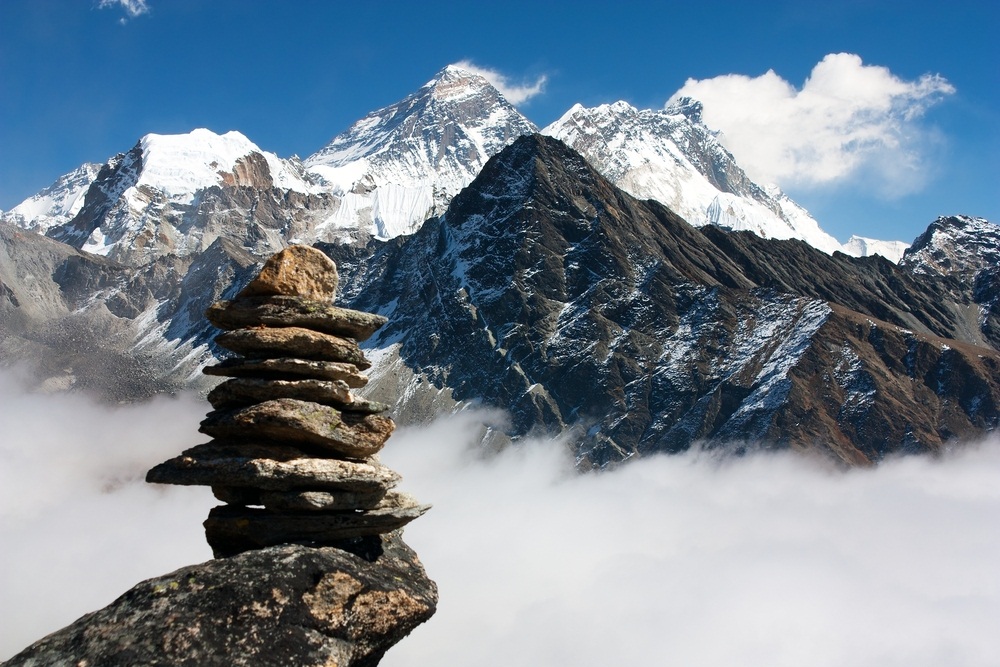 Mount Everest is the world’s highest mountain. Astonishingly, the rock at its peak—29,000 feet up—was once on the bottom of an ancient ocean. The movement of Earth’s plates pushed the old seabed onto the roof of the world. Pieces of 470-million-year-old shells have been found embedded in the rocky summit. Piles of flat stones are left as memorials to people who died while trying to climb Everest and other Himalayan peaks. (Dabiel Prudek/ Shutterstock)