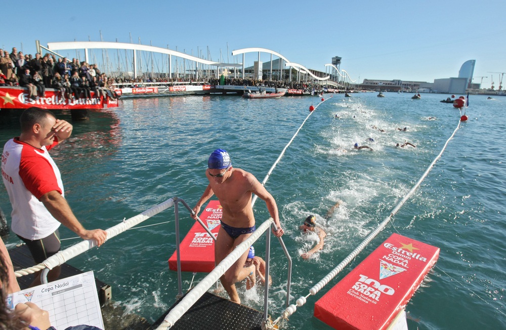 Swimmers in Barcelona, Spain, cross the city’s Old Harbor during an open water swim. The distance is equivalent to four lengths of an Olympic-sized pool. (Maxisport/ Shutterstock)