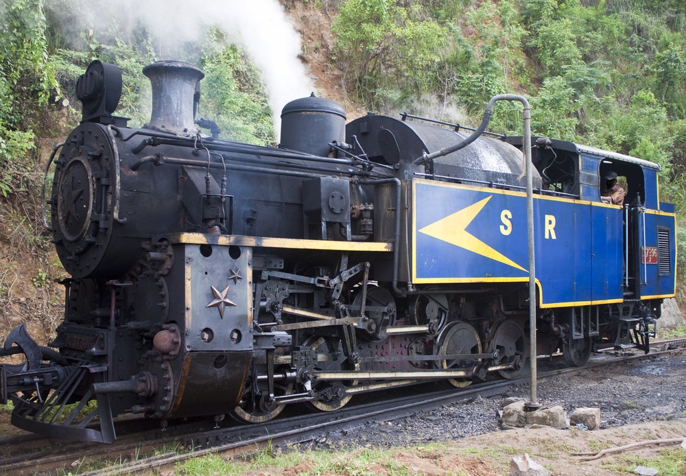 Steam locomotives run on fire, fuel, and water. Large amounts of water are taken on at the station, along with coal, wood, or oil. The fuel is heated in a firebox to create high-pressure steam. The steam fuels the engine, which drives the wheels. The release of excess steam is what makes the choo-choo-choo-choo sound. This old steam locomotive was built in 1908 and is still running in Nilgiri, India. (MR/ Shutterstock)