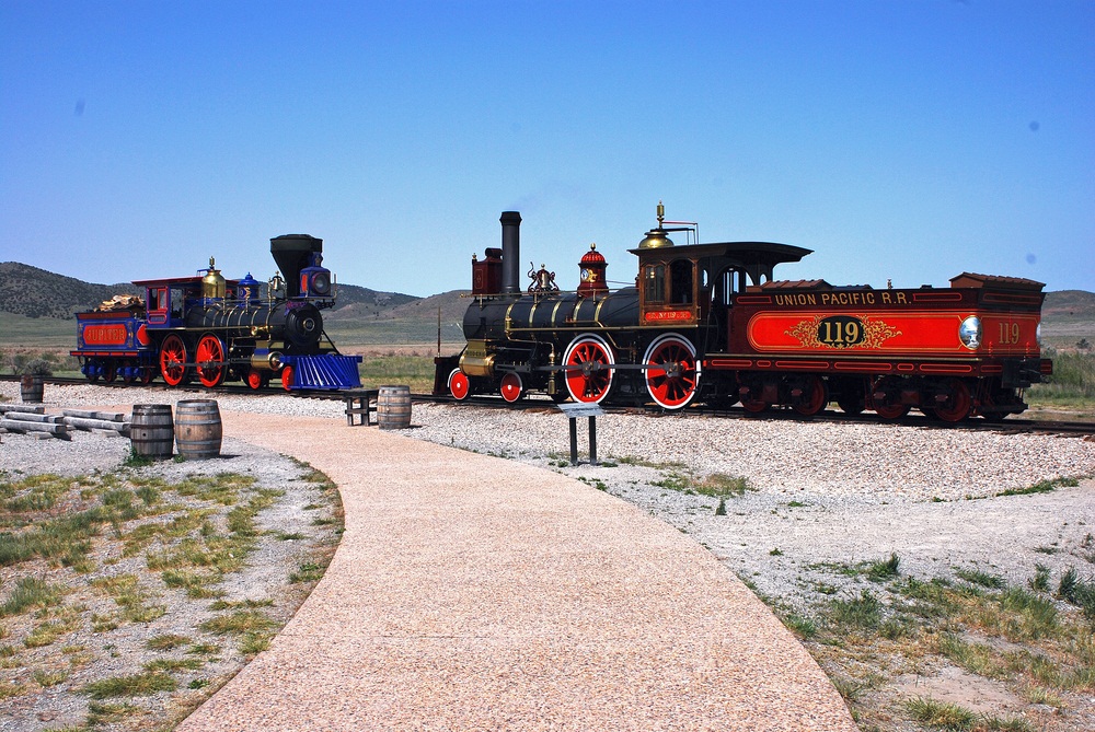 At Golden Spike National Park in Utah, two trains re-enact the completion of the transcontinental railroad. The two steam locomotives are working replicas of the Union Pacific #119 and Central Pacific Jupiter. (Jerry Susoeff/ Shutterstock)