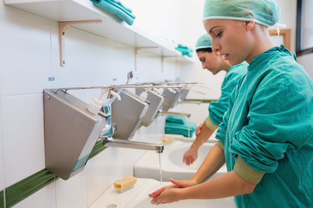 In the old days, surgeons didn’t wash their hands before performing surgery—and as a result about half their patients died of infections. The surgeons were picking up germs from one patient and spreading them to another. When they began cleaning their hands and keeping operating rooms and equipment sterile, death rates from surgery plummeted. (wavebreakmedia/ Shutterstock) 
