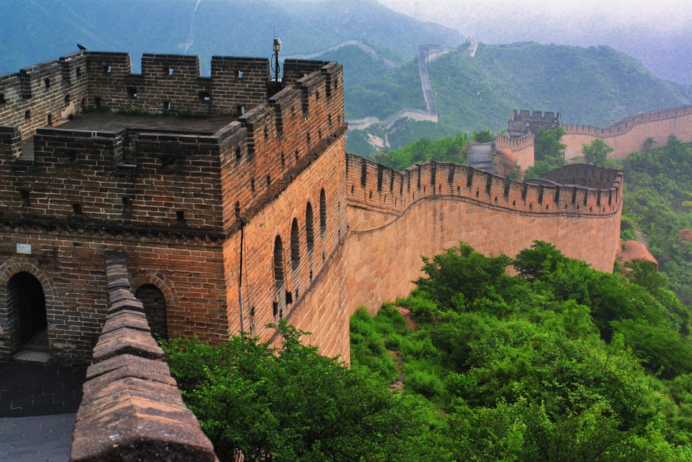 Emperor Qin Shi Huang initiated the construction of the Great Wall of China to protect against invasions from the north. Although Qin Shi Huang’s wall is said to have stretched for 3,100 miles, very little of the original survives today. (Yuri Yavnik/ Shutterstock) 