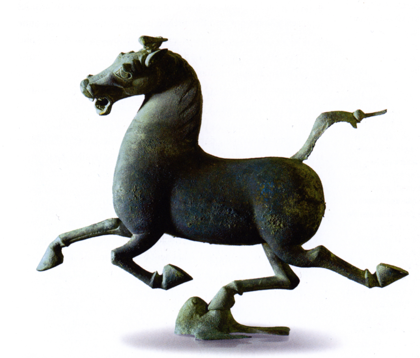 The Flying Horse of Gansu is a bronze statue discovered in a Han Dynasty general’s tomb at an important stop along the Silk Road. A “heavenly steed,” this flying horse is shown stepping on a surprised sparrow as they both streak across the sky. It is considered a masterpiece of ancient Chinese artwork. (Photo via Wikimedia Commons) 