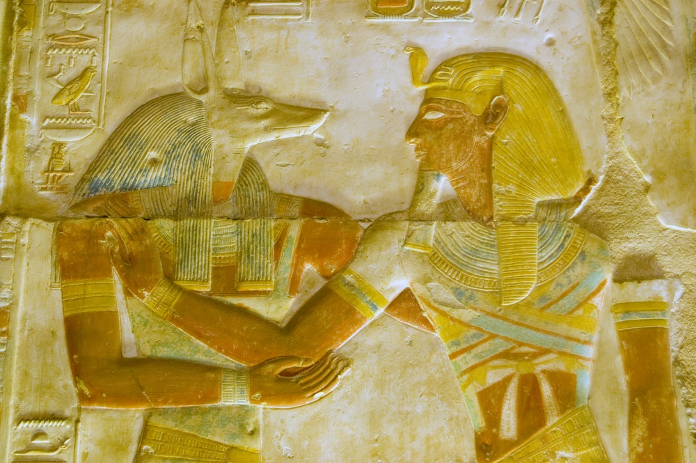 The pharaoh Seti, who died in 1279 BC, is shown being welcomed by Anubis, the jackal-headed god and protector of the dead. This carving is found at the Temple of Abydos, which is dedicated to Seti. (BasPhoto/ Shutterstock) 