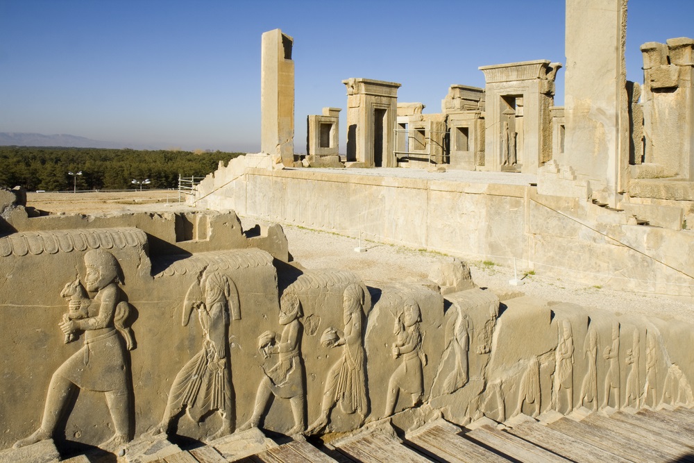 Persepolis was the center of the Archaemenid Empire, with palaces dedicated to its rulers Darius the Great and Xerxes. Now in ruins, this stairway shows the people of the empire walking into the palace, bringing gifts. (arazu/ Shutterstock) 