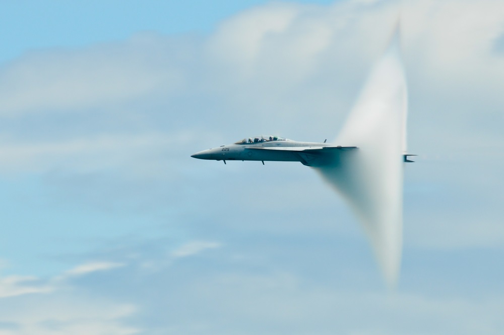 When an object moves at the speed of sound, it is said to be traveling at Mach 1. When a jet surpasses the speed of sound, it “breaks the sound barrier” and causes a sonic boom—which sounds like a clap of thunder. When it’s humid, jets form a vapor cone as they break the sound barrier.  (Katerina_S/ Shutterstock) 