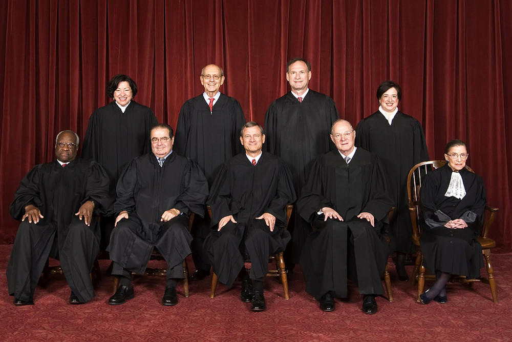Meet the Supremes! From top left to right, Sonia Sotomayor, Stephen Breyer, Samuel Alito, and Elena Kagan. From bottom left to right, Clarence Thomas, Antonin Scalia, John Roberts, Anthony Kennedy, and Ruth Bader Ginsburg. John Roberts is the chief justice, and Elena Kagan is the “junior justice,” which means she is the justice most recently appointed to the court. (Photo Credit: Steve Petteway)