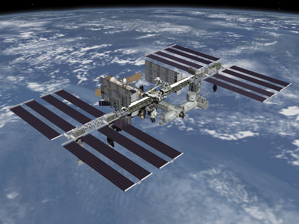 About 200 miles up, the International Space Station is in motion around the Earth. The space station travels fast. In fact, it circles the Earth once every 90 minutes. (NASA)