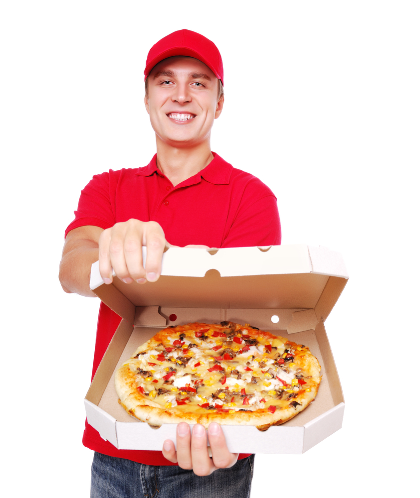 Pizza companies sell a combination of goods and services. The pizza is a “good.” Delivering the pizza to your door is a “service.” (Kalmatsuy / Shutterstock)