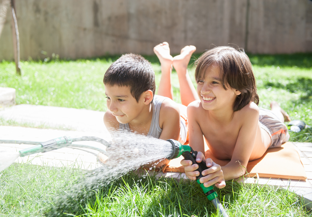 You can explore science, engineering, and math concepts while developing creative and critical thinking skills with simple water games. (Zurijeta/Shutterstock)